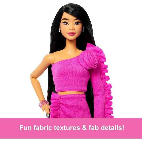 Barbie Deluxe Style Doll #2 in Barbiecore Outfit, Black Hair and Glittery Prosthetic Leg, Pink Top and Skirt Set with Rosette Detail and Accessories