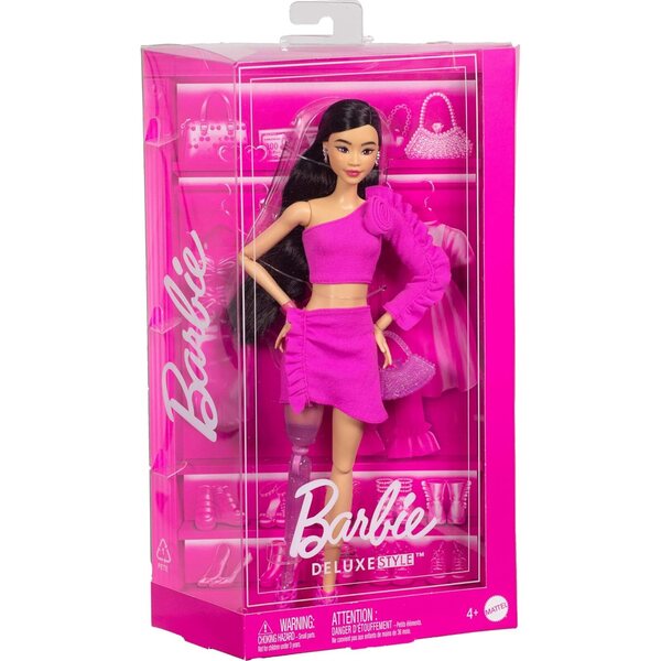 Barbie Deluxe Style Doll #2 in Barbiecore Outfit, Black Hair and Glittery Prosthetic Leg, Pink Top and Skirt Set with Rosette Detail and Accessories