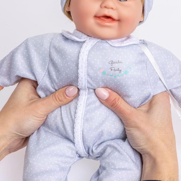 Miękka lalka o średnicy 40 cm z zespołem Downa, brązowymi włosami i magiczną butelką JC Toys