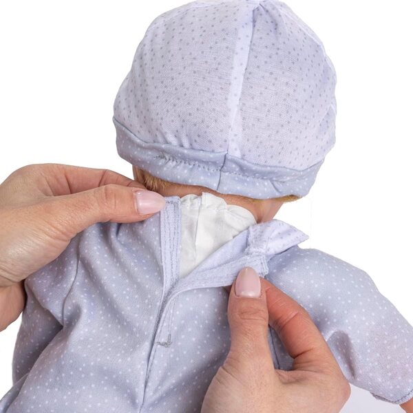 Miękka lalka o średnicy 40 cm z zespołem Downa, brązowymi włosami i magiczną butelką JC Toys