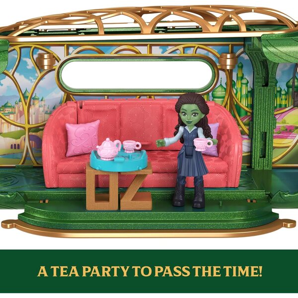 Mattel Wicked Emerald City Train Spielset mit Elphaba, 3 Spielfeldern und 14 Zubehörteilen