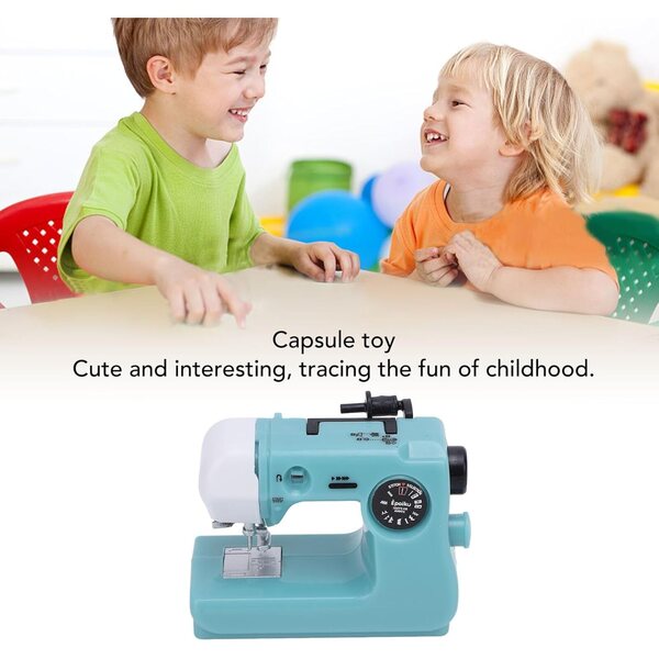 Kleine blaue Miniatur-Nähmaschine für Dekorationen und Sammlungen