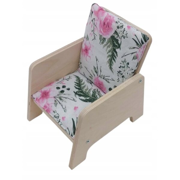Ein Zwillingspuppenbett mit Bettwäsche und einem Holzstuhl
