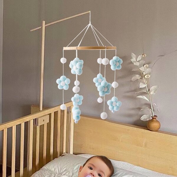 Hängespielzeug für Babybetten mit rotierender Bewegung und zartblauem Design