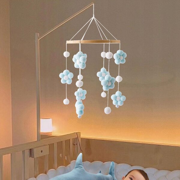 Hängespielzeug für Babybetten mit rotierender Bewegung und zartblauem Design