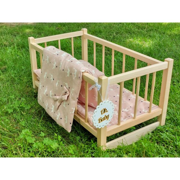 Dondolo in legno per bambole con set biancheria rosa in confezione elegante