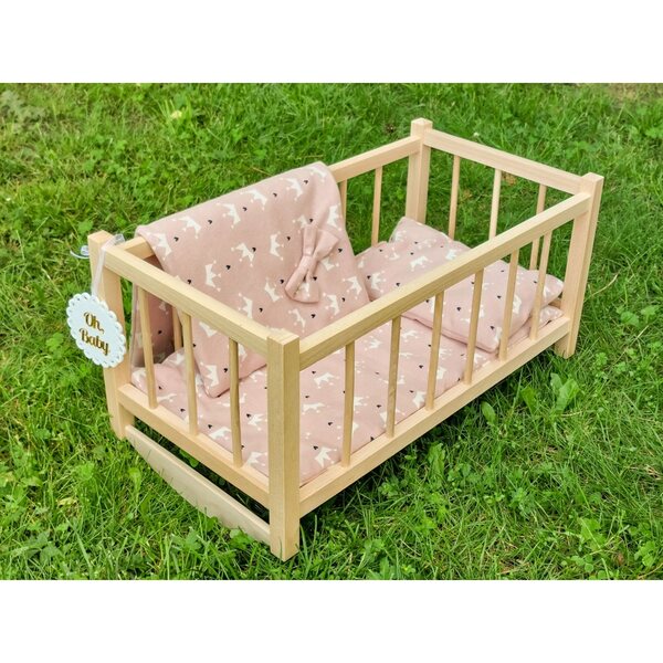 Dondolo in legno per bambole con set biancheria rosa in confezione elegante