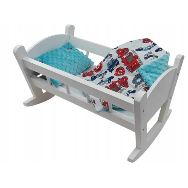Eine weiße Puppenwiege mit Matratze und Laken, ein Holzset für Kinder