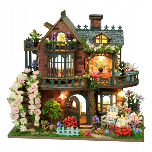 Ein Set zur Selbstmontage eines Miniaturhauses aus Holz mit LED