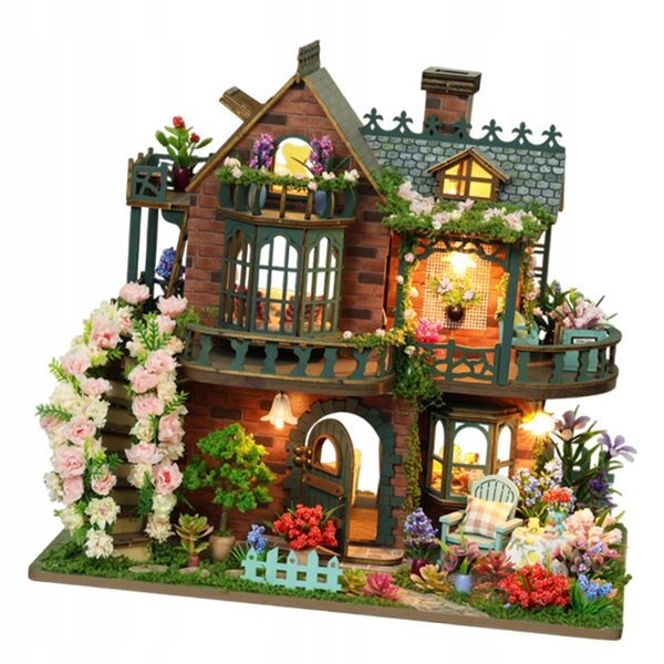 Ein Set zur Selbstmontage eines Miniaturhauses aus Holz mit LED