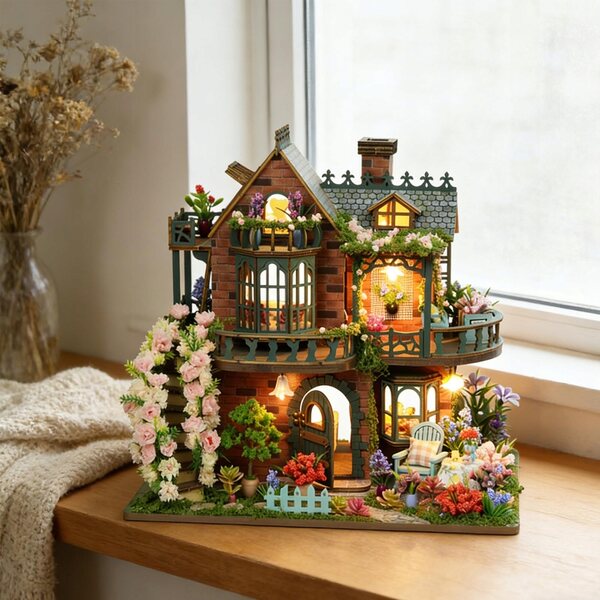 Ein Set zur Selbstmontage eines Miniaturhauses aus Holz mit LED