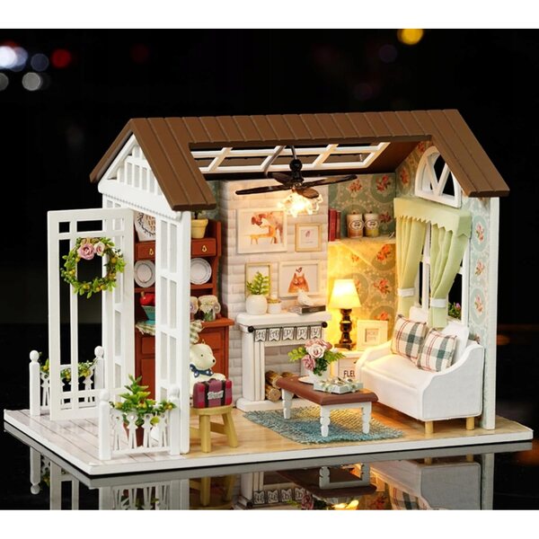 Casa in legno fai da te con mobili e decorazioni in miniatura