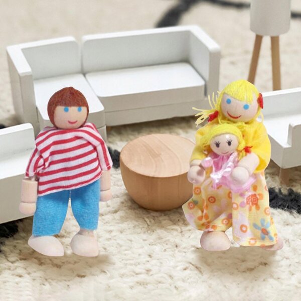 Ein hölzernes Puppenhaus mit Familienset und Miniaturzubehör für Kinder