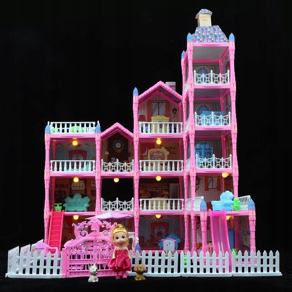 Ein Puppenhaus, ein rosa Prinzessinnenschloss mit Möbeln, ein kreatives Lernspielzeug