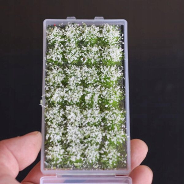 Miniatuur witte bloemen voor modelspoorwegen en landschapsarchitectuur