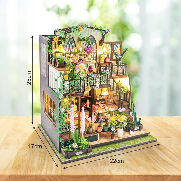 Casa in legno in miniatura con LED e fiori - set da montare