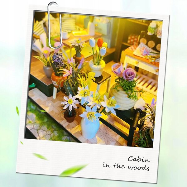Casa in legno in miniatura con LED e fiori - set da montare