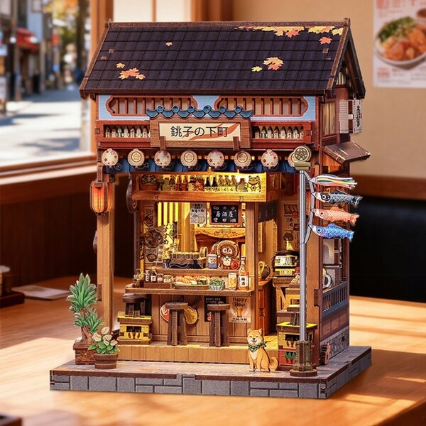 Japanisches Miniatur-3D-Holzhaus mit LEDs und roten Izakaya-Laternen