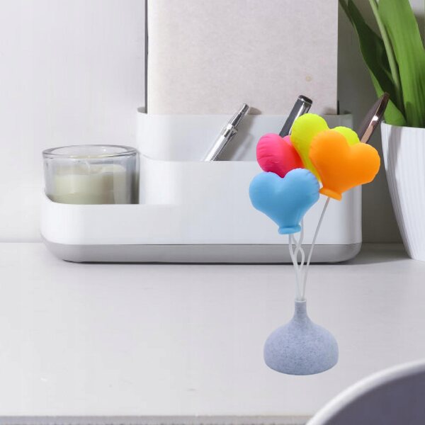 Miniature dekoration med hjerteballon til scenografi og modellering
