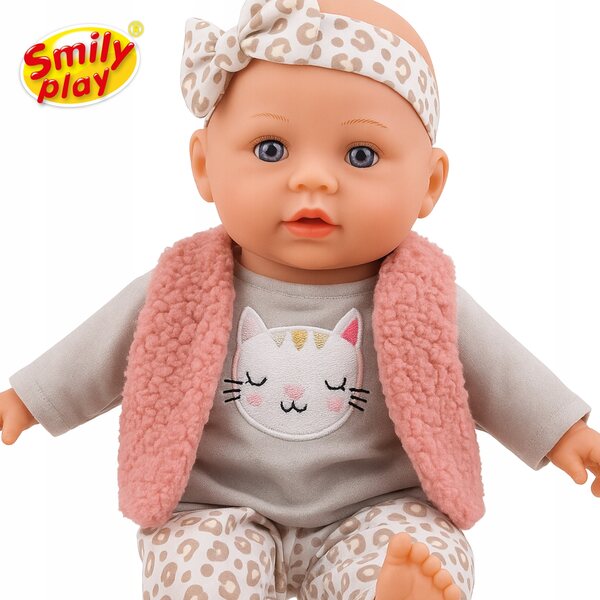 Die 32 cm große interaktive Puppe spricht und singt auf Polnisch und Englisch. Smily Play