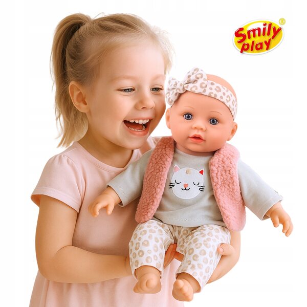 Die 32 cm große interaktive Puppe spricht und singt auf Polnisch und Englisch. Smily Play