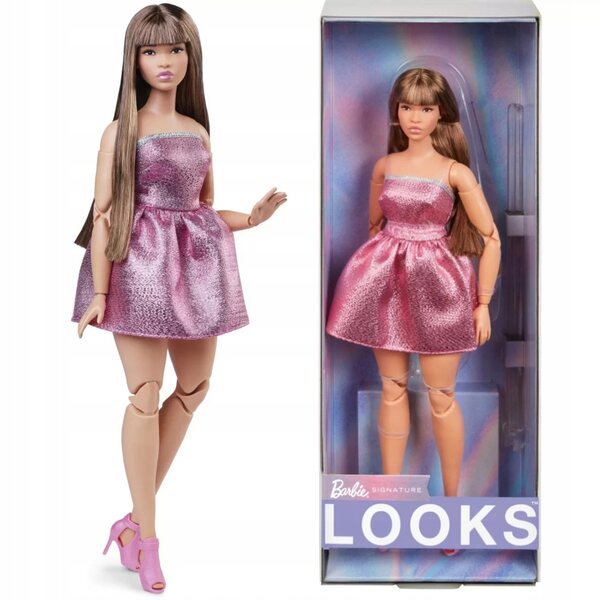 Barbie sieht Sammlerpuppe mit rosa Kleid und langen Haaren im 90er-Jahre-Stil aus