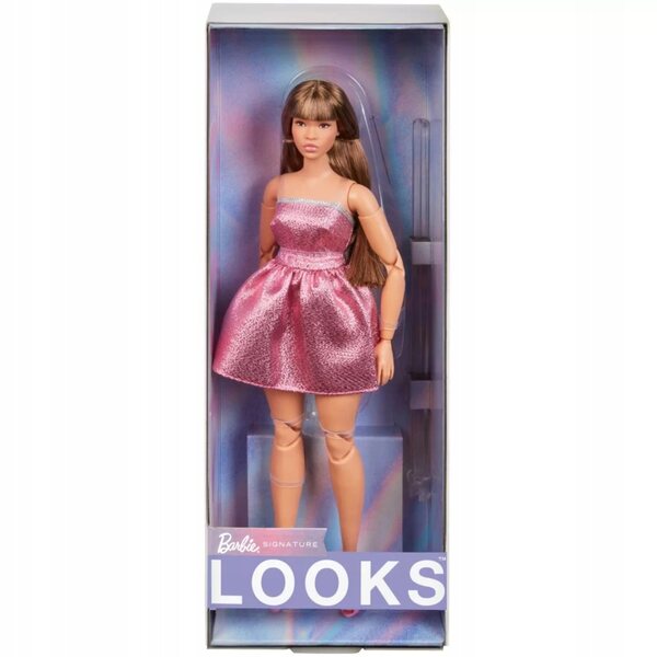 Barbie sieht Sammlerpuppe mit rosa Kleid und langen Haaren im 90er-Jahre-Stil aus