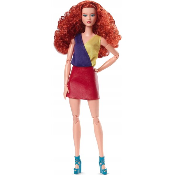 Barbie-Signatur-Looks mit welligem rotem Haar und modischer Kleidung