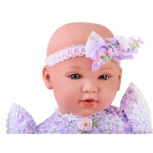 Interaktive Babypuppe 46 cm in fliederfarbenem Kleid mit Zubehör inklusive