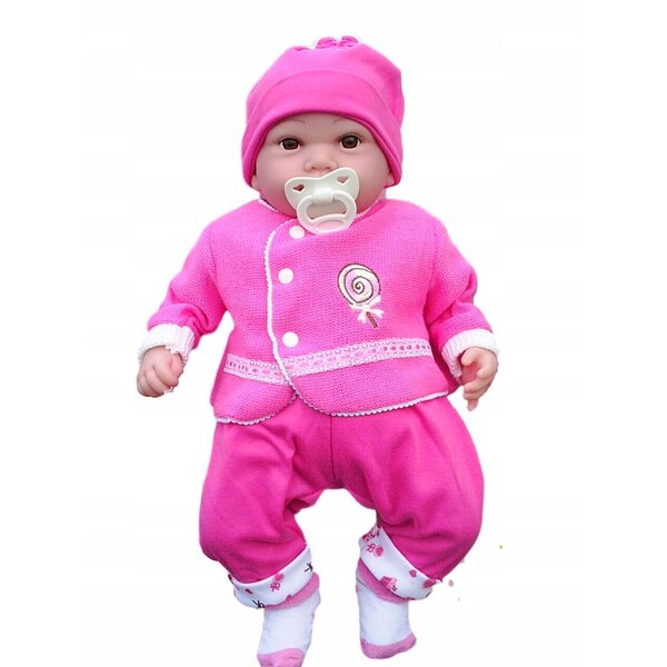 Eine kleine Puppe, die auf Polnisch spricht und singt, mit rosa Kleidung und einem milchigen Effekt