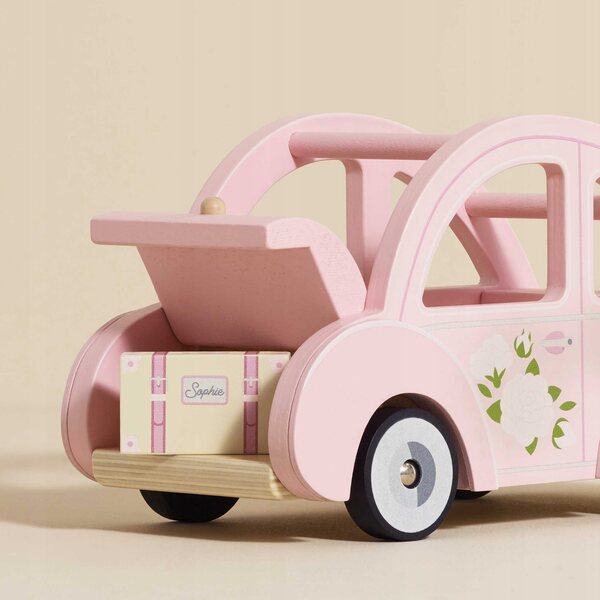 Rosafarbenes Holzauto von Le Toy Van Sophie mit Koffer und aufklappbarem Kofferraum