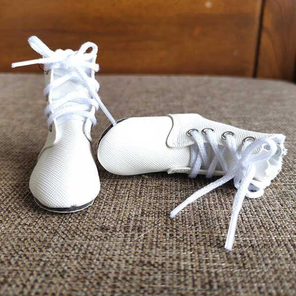 Scarpe in plastica bianche per bambole 60 cm accessori moda e inverno