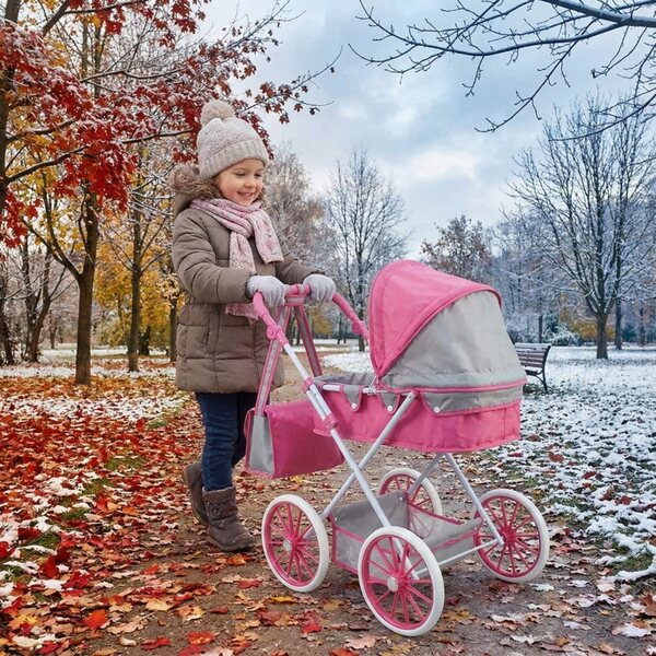 Un passeggino per bambole profondo e solido in metallo, con grandi ruote e una borsa, rosa