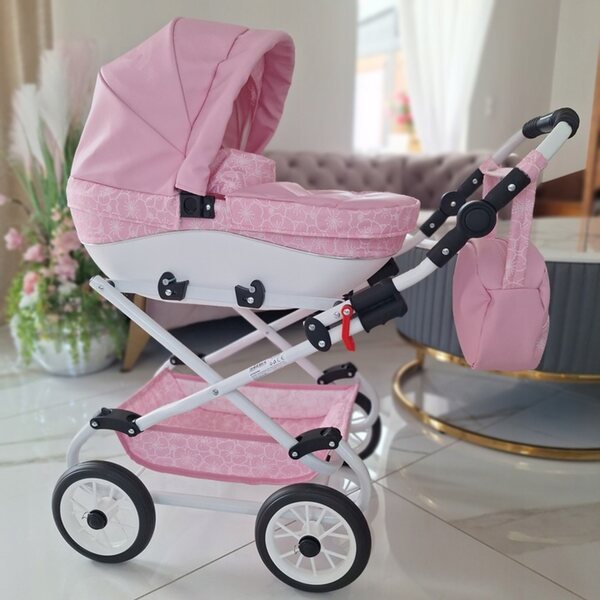 Passeggino per bambole Nicol Premium rosa cipria, design realistico e dettagli eleganti