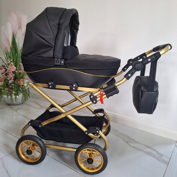 Hochwertiger schwarzer Puppenwagen mit goldenen Details, realistischem und tiefem Design