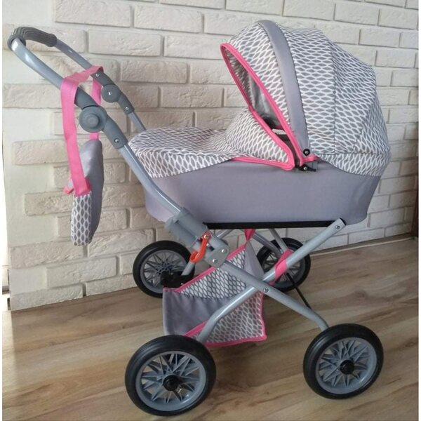 Passeggino per bambole Kasia: un passeggino profondo con maniglia regolabile e accessori