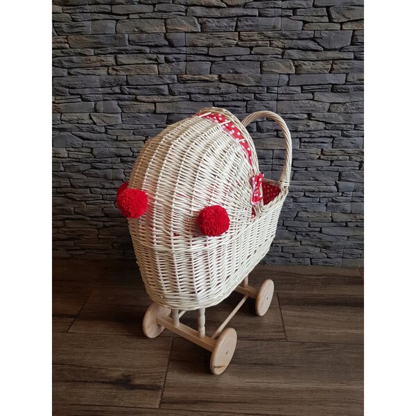 Korbwagen für Kinderpuppen mit weißen ecrufarbenen Pompons