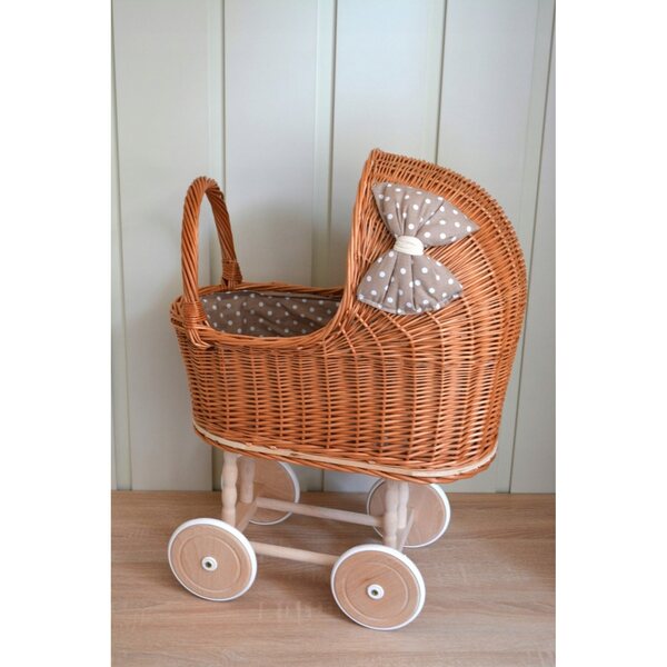 Puppenwagen aus Naturgeflecht mit Gummirädern und beige-weißen Details