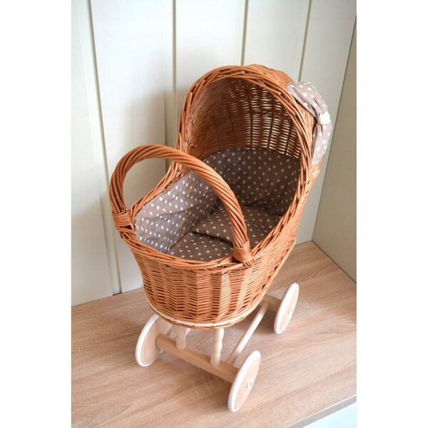 Puppenwagen aus Naturgeflecht mit Gummirädern und beige-weißen Details