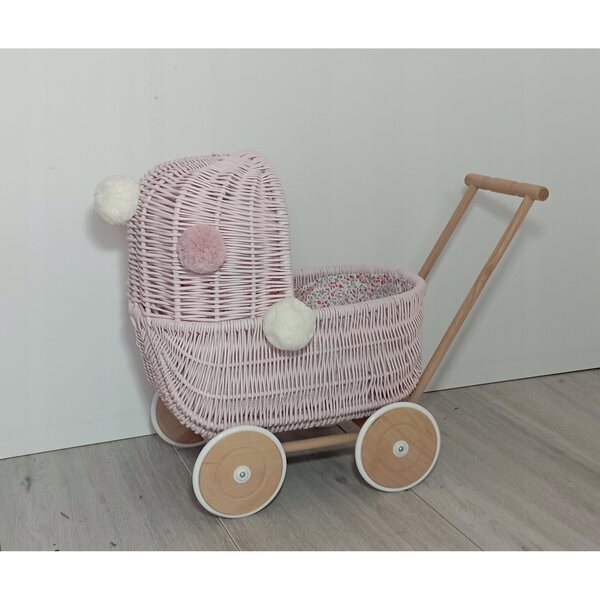 Passeggino per bambole in vimini rosa con biancheria da letto e pompon - fatto a mano