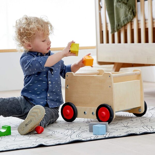 HABA Dragon Kinderwagen mit Lauflernhilfe für Kinder ab 10 Monaten, sicher und geräumig