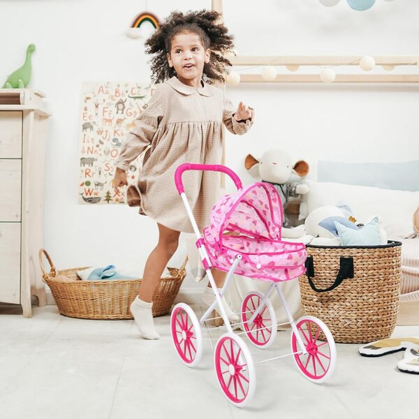Rosa Spielzeug-Kinderwagen für Puppen mit viel Platz und interaktivem Zubehör