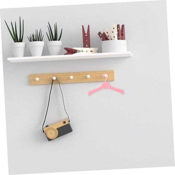 Mini-Puppenkleiderbügel aus rosa Kunststoff – 100 Stück, glatte Oberflächen und Retro-Design