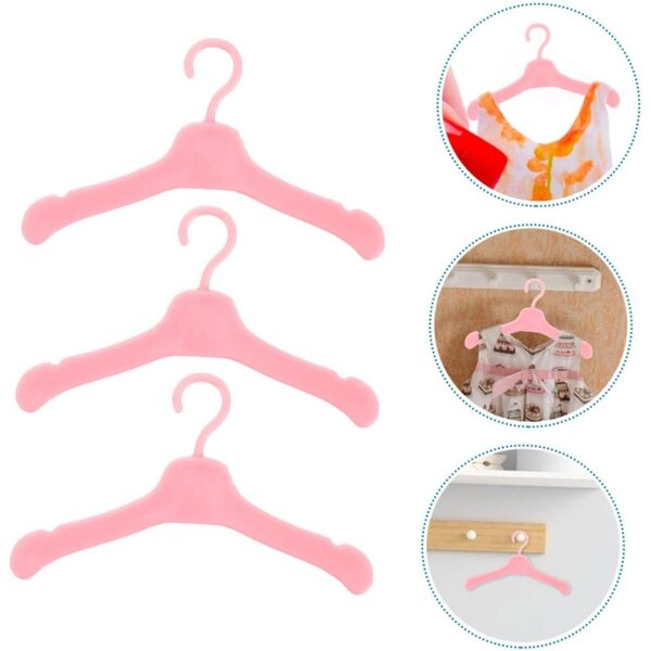 Mini-Puppenkleiderbügel aus rosa Kunststoff – 100 Stück, glatte Oberflächen und Retro-Design