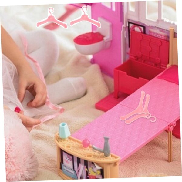 60 stilvolle und langlebige rosafarbene Mini-Puppen-Kleiderbügel für die Spielzeuggarderobe