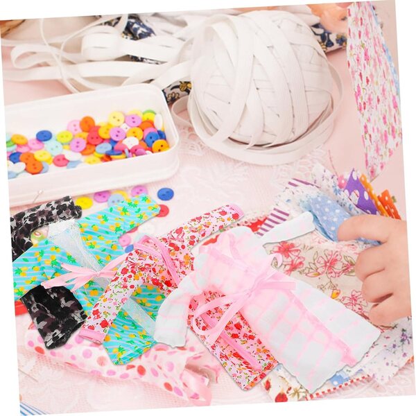 4-teiliges Puppenkleidungsset mit Bademantel, Handtuch und weichem Stirnband