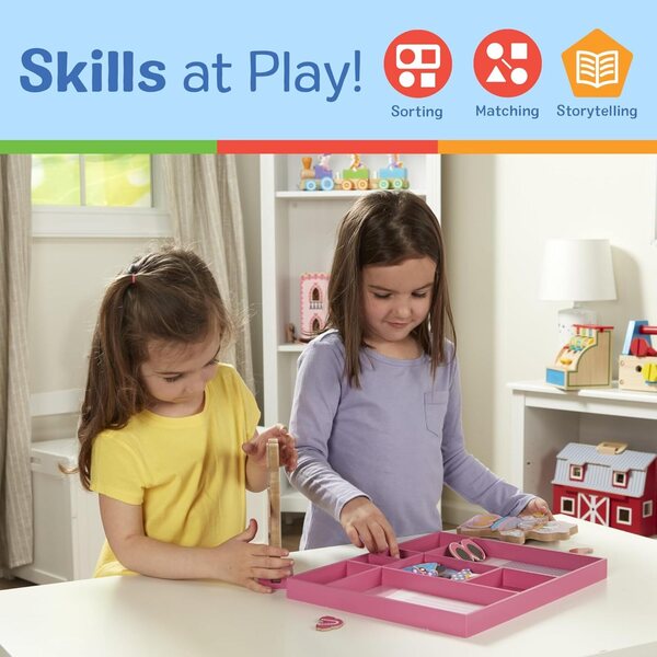 Magnetisches Holzspielset „Minnie & Daisy“ mit Kleidung und Accessoires von Melissa & Doug