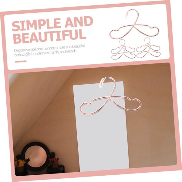 Set mit 5 Miniatur-Cintres für Puppenkleidung in Eisen-Roségold, 12 x 7,5 cm