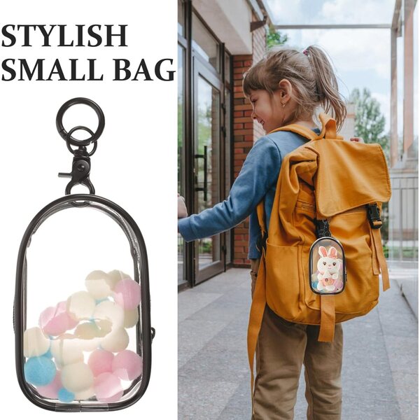 Transparente Suspendue Outanaya-Tasche für Puppen mit Häkelarbeit, kompakt und schützend