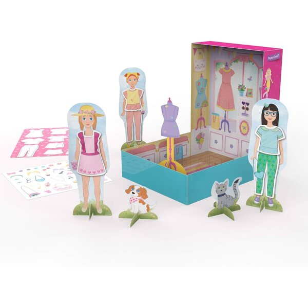 Kindermode-Boutique – Farbige und gekleidete Papierpuppen